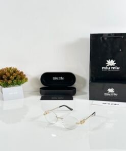Miu Miu WMNS 1025 Gold Day Night Colour Changing Glass
